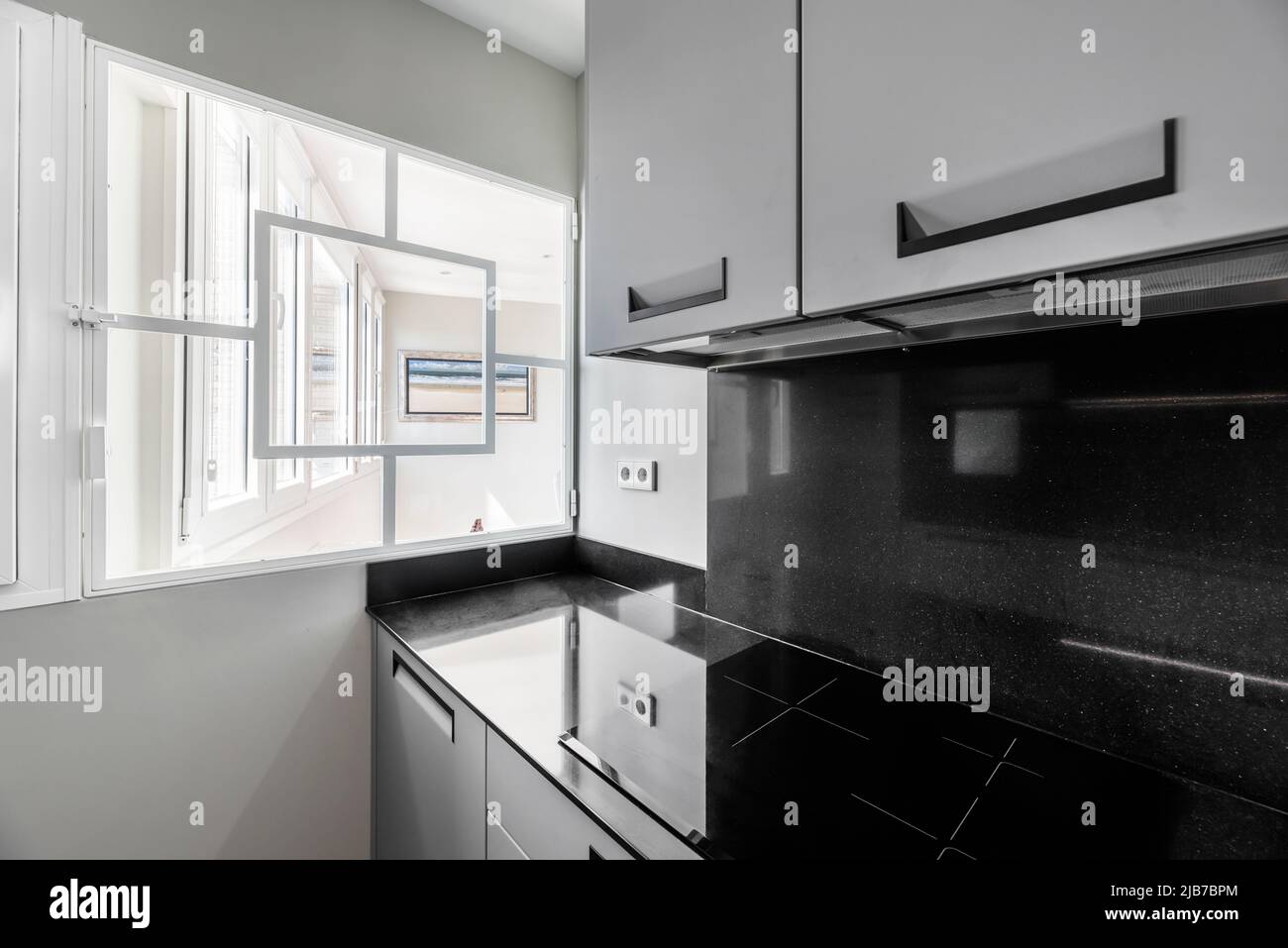 Kitchen corner with newly installed gray and drawers with