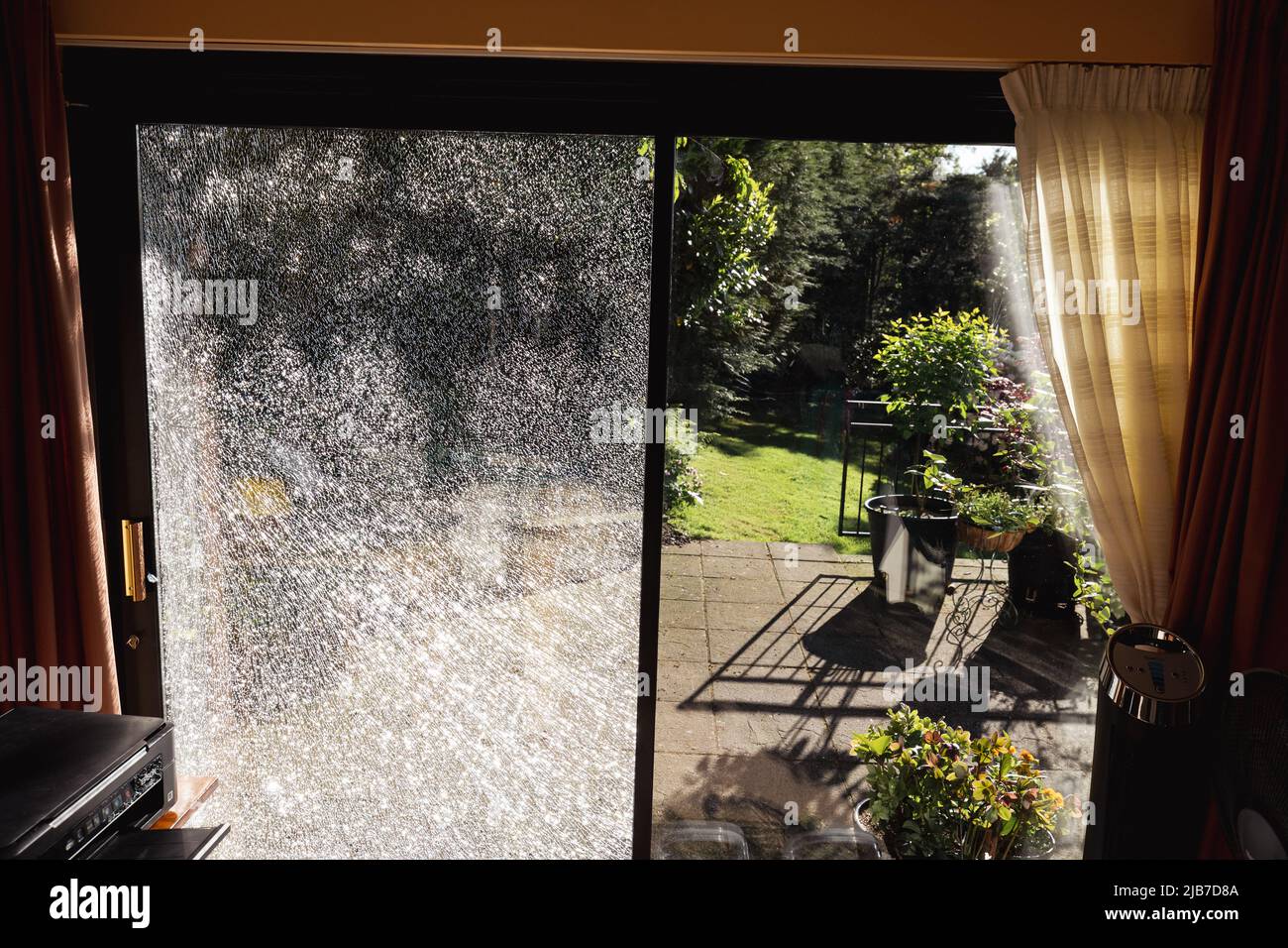 broken crazed toughened glass Stock Photo - Alamy
