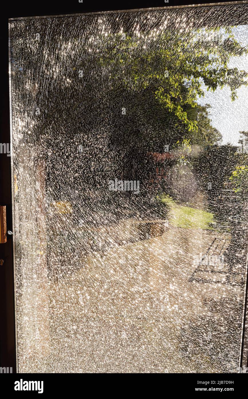 broken crazed toughened glass Stock Photo