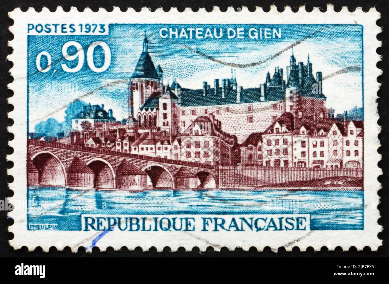 FRANCE - CIRCA 1955: a stamp printed in the France shows Gien Chateau, Loiret Department, France, circa 1955 Stock Photo