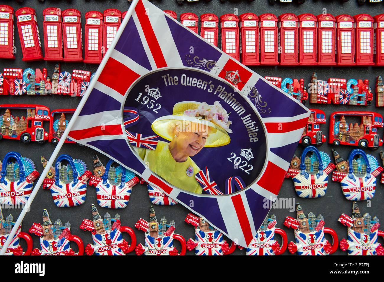 Platinum Jubilee souvenir flags on a stall in Piccadilly Circus London Stock Photo
