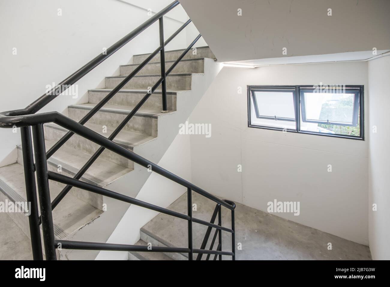 Stairwell and emergency exit in building Stock Photo