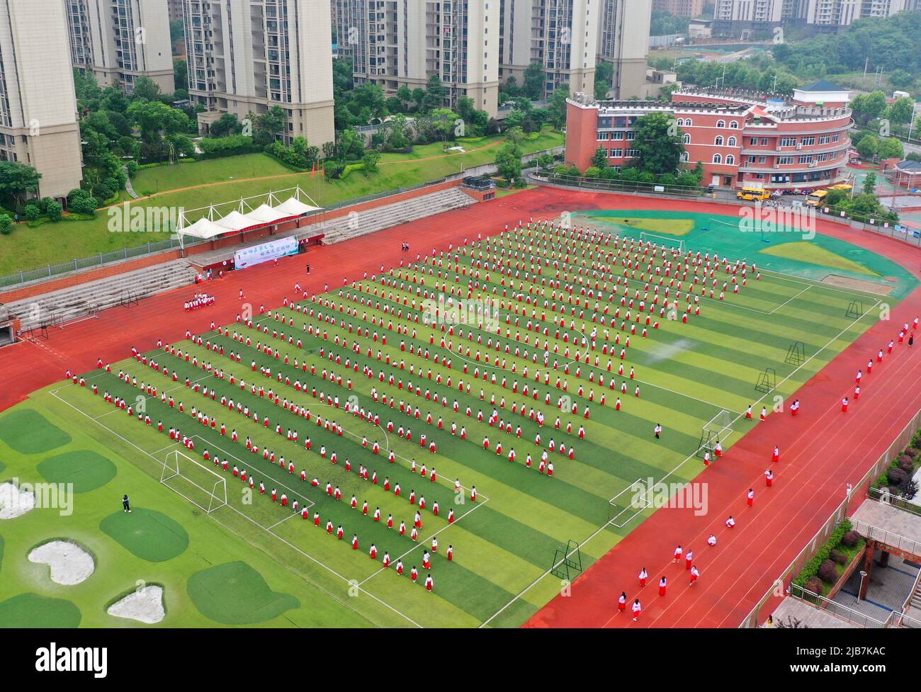 YICHANG, CHINA JUNE 1, 2022 More than 1,000 students sing and dance