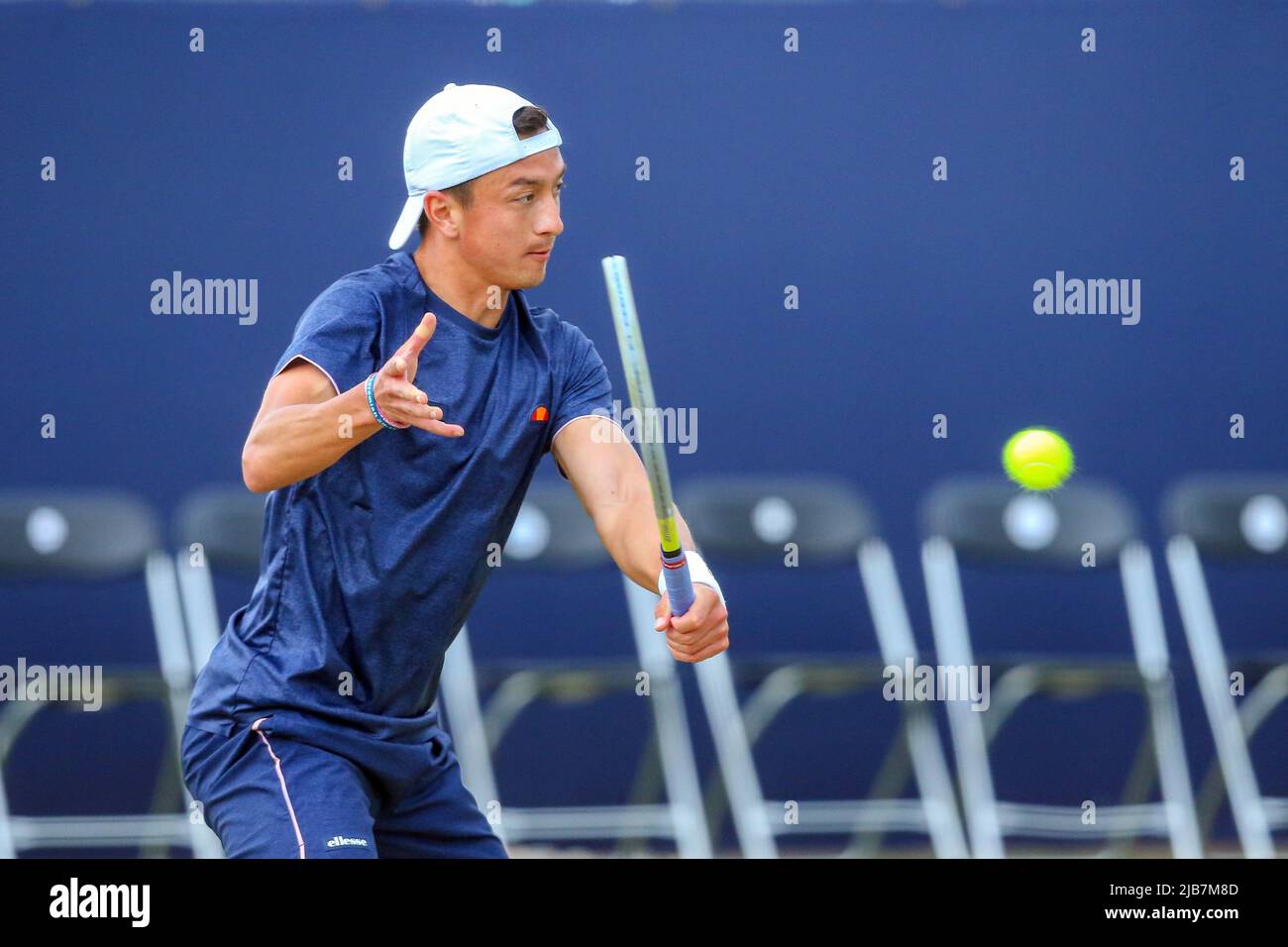 3rd June 2022; Surbiton Racket &amp; Fitness Club, Surbiton, London, England: Surbiton Trophy Tennis tournament: Ryan Peniston (GBR) plays a backhand back to Otto Virtanen (FIN) Stock Photo