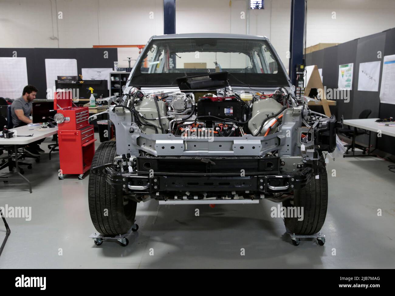A partially dismantled Rivian R1T electric truck is seen during its teardown at the Munro & Associates headquarters in Auburn Hills, Michigan, U.S., June 3, 2022.  REUTERS/Rebecca Cook Stock Photo