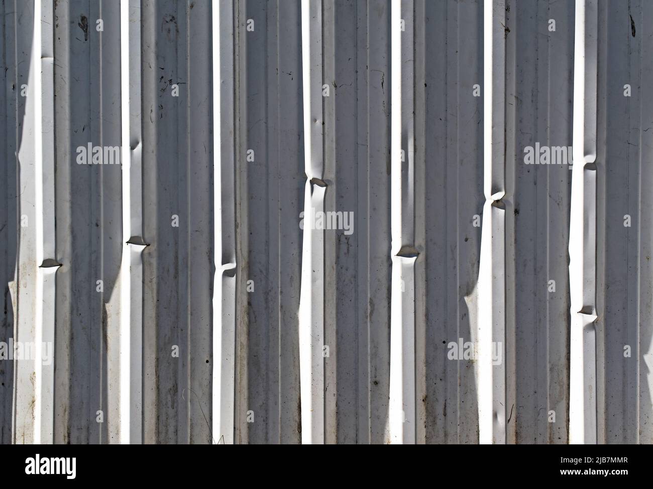White metalllic surface whth vertical stripes Stock Photo