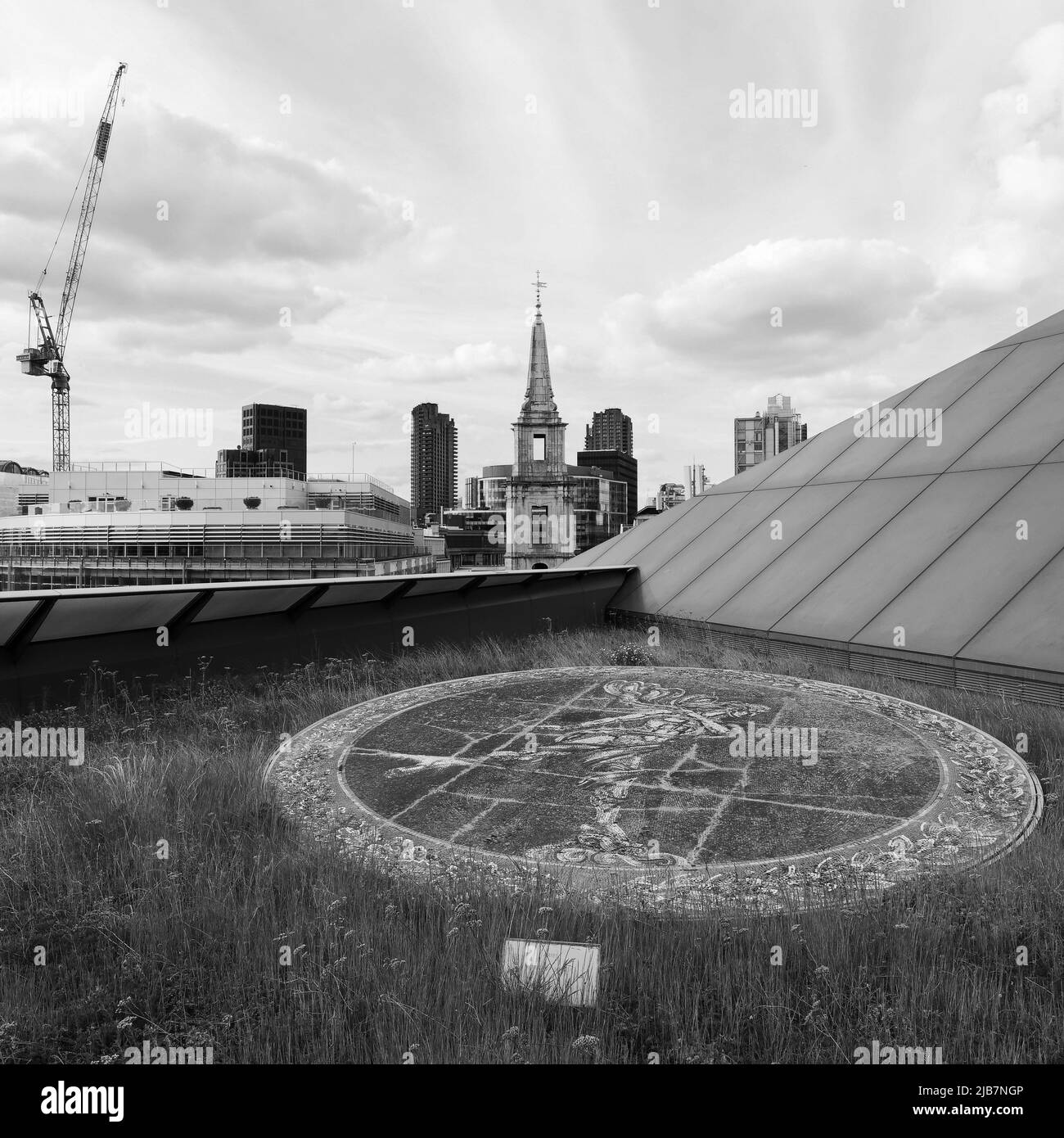 London, Greater London, England, May 21 2022: View from One New Change toward a church tower. Artwork in the foreground. Stock Photo