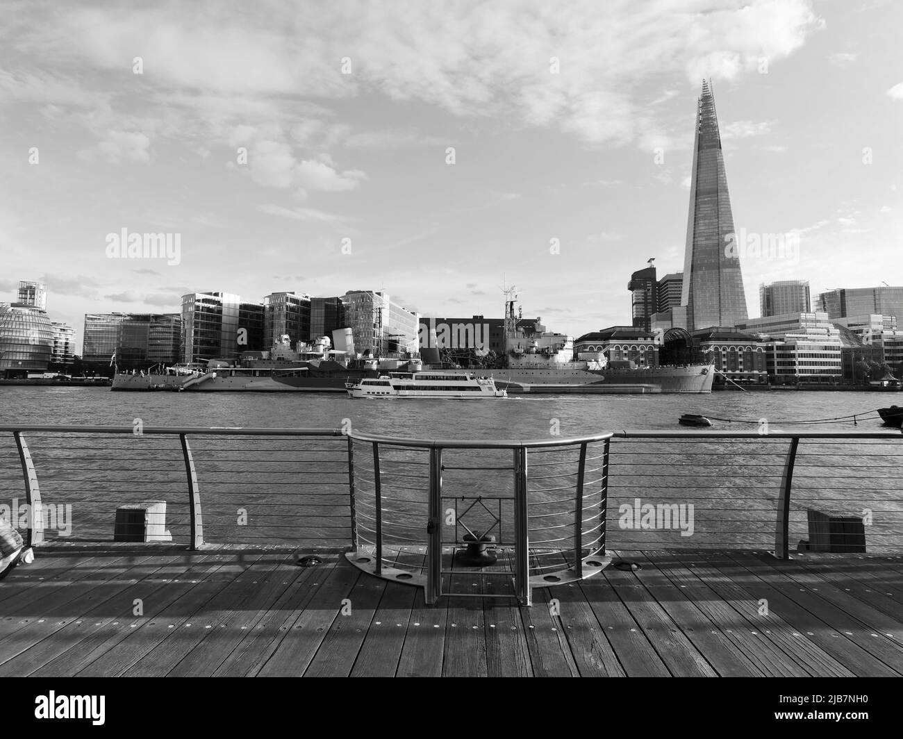 London, Greater London, England, May 21 2022: View towards Southwark with HMS Belfast and The Shard, as seen from the north bank of the River Thames. Stock Photo