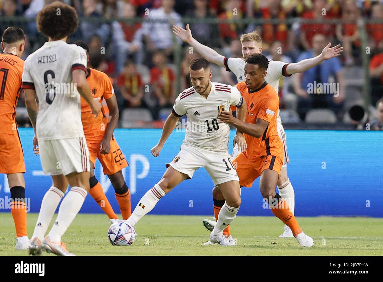 Brussels, Belgium. 03rd June, 2022. Belgium's Eden Hazard and Netherlands'  Jurrien Timber fight for the ball during a soccer game between Belgian  national team the Red Devils and the Netherlands, Friday 03