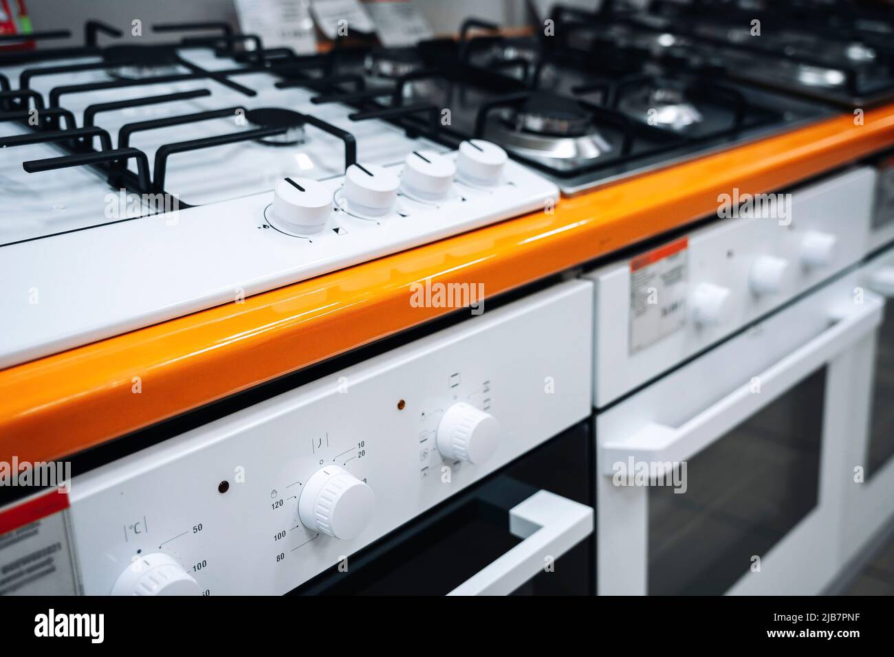 sale of gas cooktops in a home appliance store. built-in hob Stock Photo