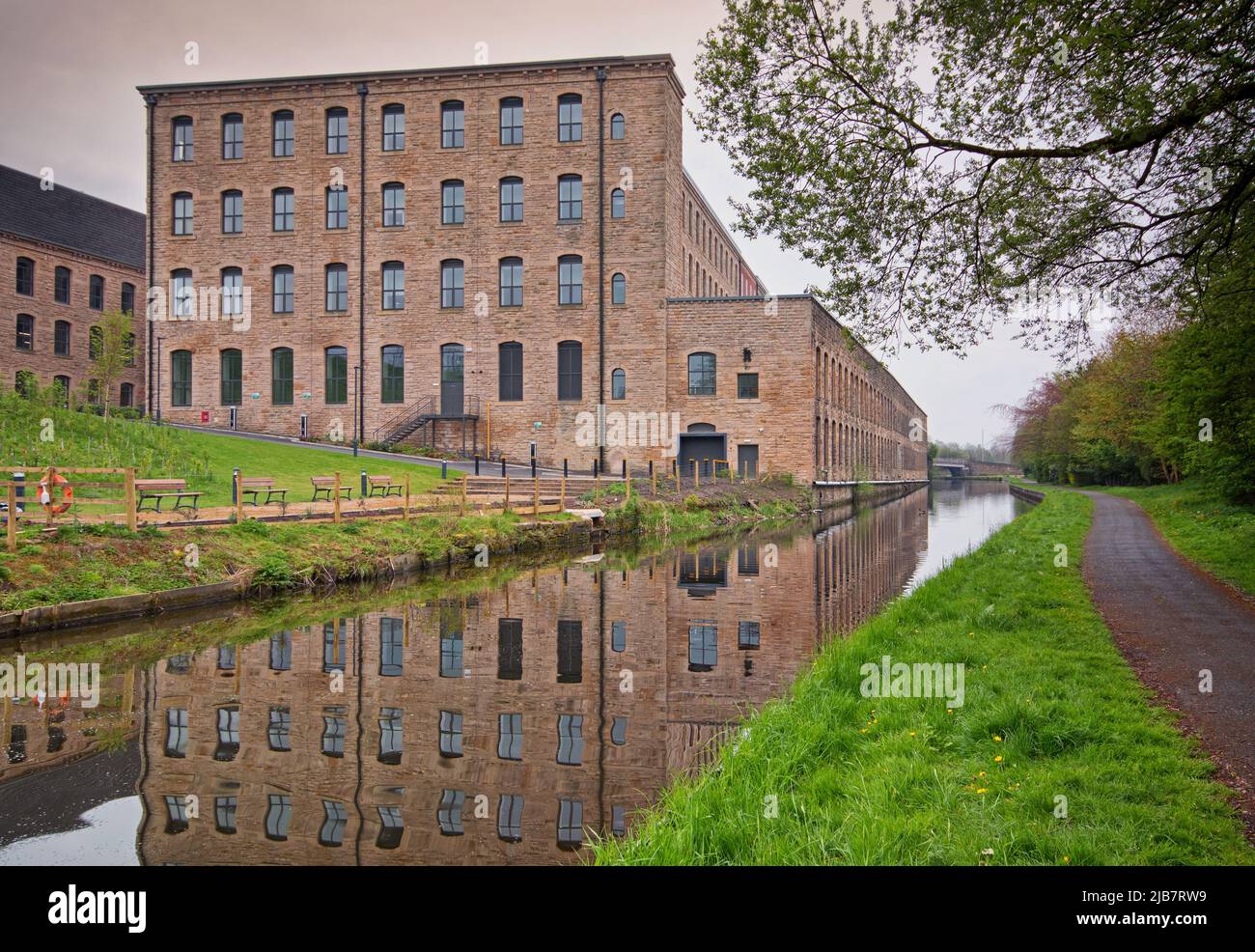 Tunstill Mill, at the centre of the Northlight renovation project, by the Leeds and Liverpool canal Stock Photo