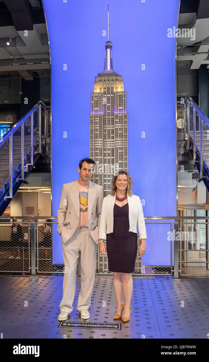 DJ Mark Ronson and Emma Wade-Smith, British Consul General visit the iconic Empire State Building to light building in purple and gold to honor the Platinum Jubilee of Queen Elizebeth II in New York on June 3, 2022. (Photo by Lev Radin/Sipa USA) Stock Photo