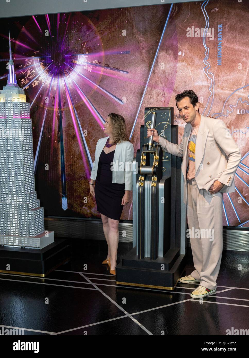 New York, NY - June 3, 2022: Emma Wade-Smith, British Consul General and DJ Mark Ronson visit the iconic Empire State Building to light building in purple and gold to honor the Platinum Jubilee of Queen Elizebeth II Stock Photo