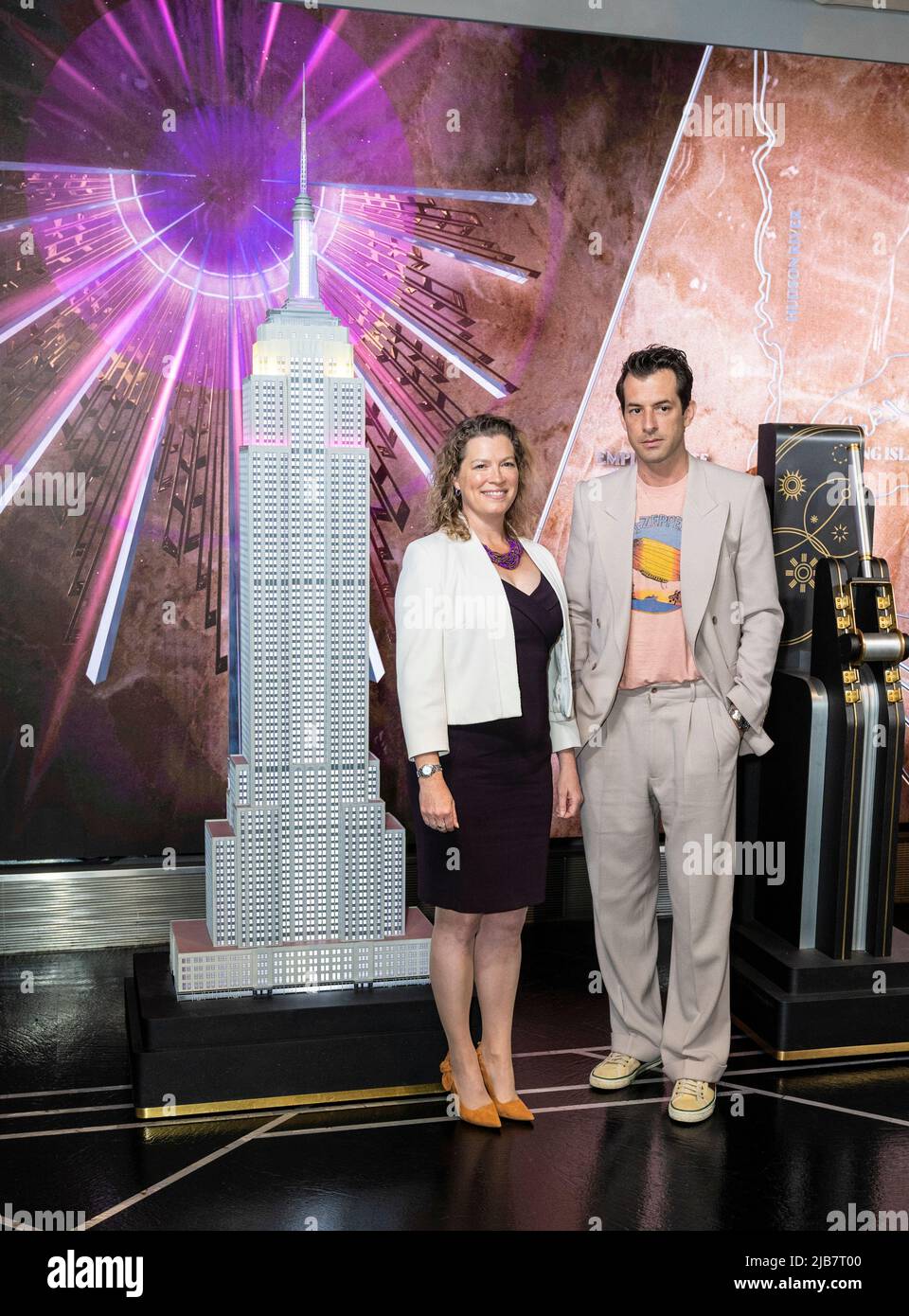 New York, NY - June 3, 2022: Emma Wade-Smith, British Consul General and DJ Mark Ronson visit the iconic Empire State Building to light building in purple and gold to honor the Platinum Jubilee of Queen Elizebeth II Stock Photo