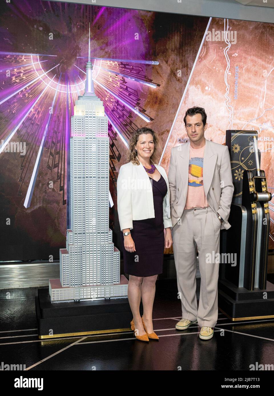 Emma Wade-Smith, British Consul General and DJ Mark Ronson visit the iconic Empire State Building to light building in purple and gold to honor the Platinum Jubilee of Queen Elizebeth II in New York on June 3, 2022. (Photo by Lev Radin/Sipa USA) Stock Photo