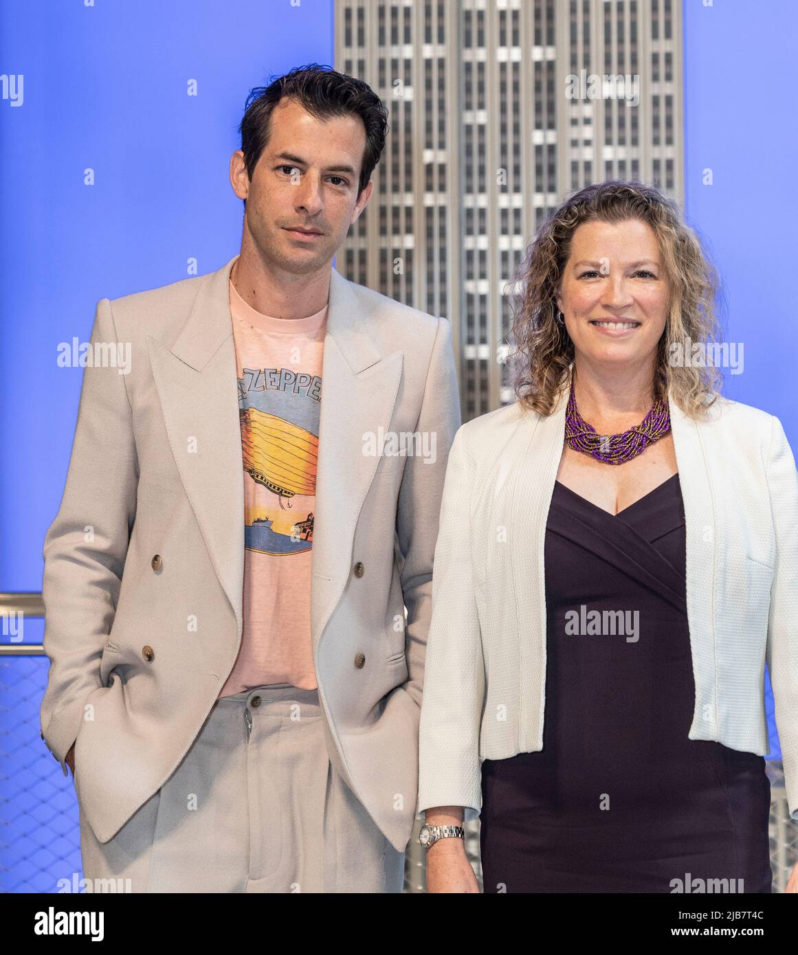 New York, NY - June 3, 2022: DJ Mark Ronson and Emma Wade-Smith, British Consul General visit the iconic Empire State Building to light building in purple and gold to honor the Platinum Jubilee of Queen Elizebeth II Stock Photo