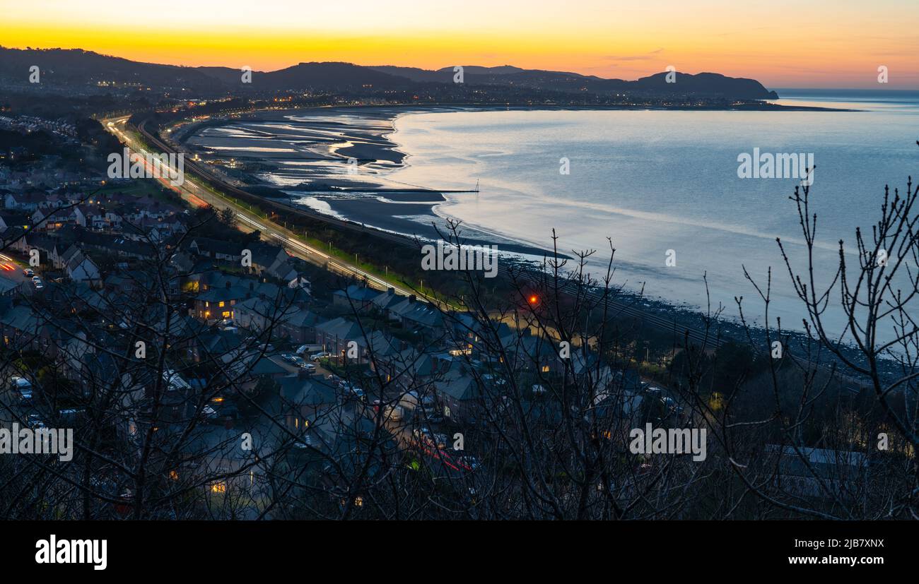The A55 Expressway passing through Colwyn Bay, viewed from Llanddulas and taken on the 18th of March 2022. Stock Photo