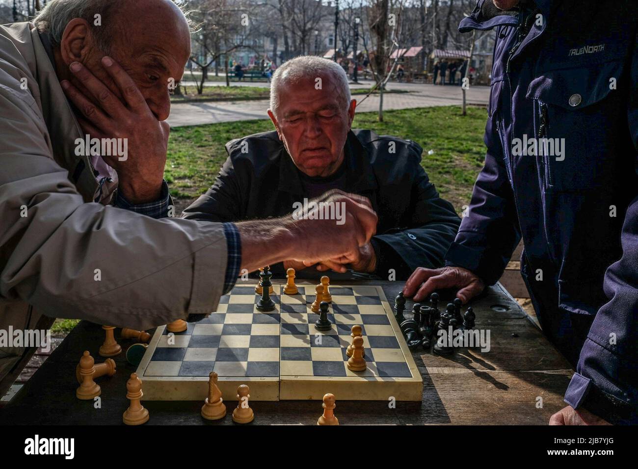 Odessa, Ukraine. 31st Mar, 2022. Elderly men play chess at the