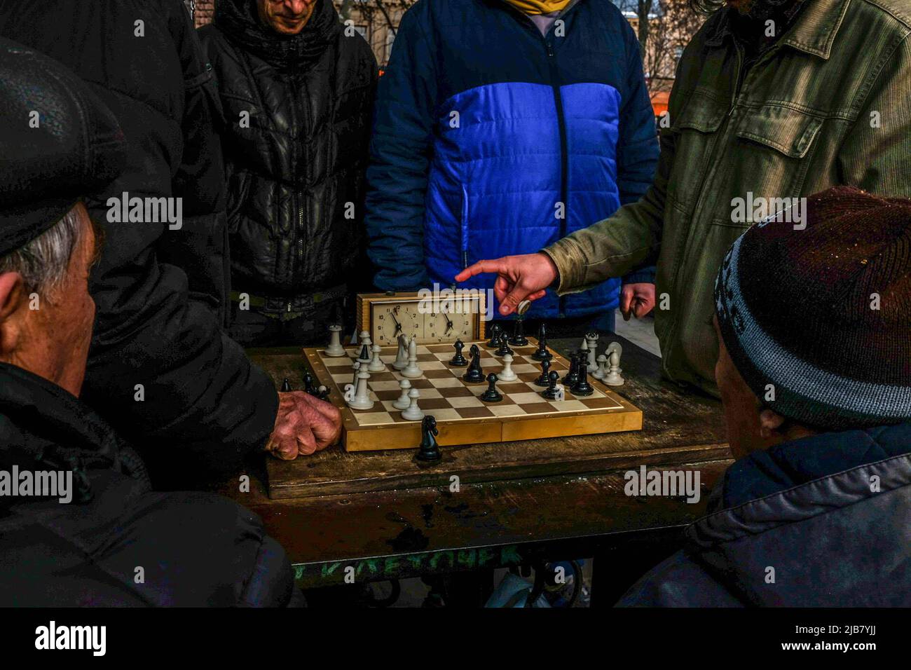 Odessa, Ukraine. 31st Mar, 2022. Elderly men play chess at the