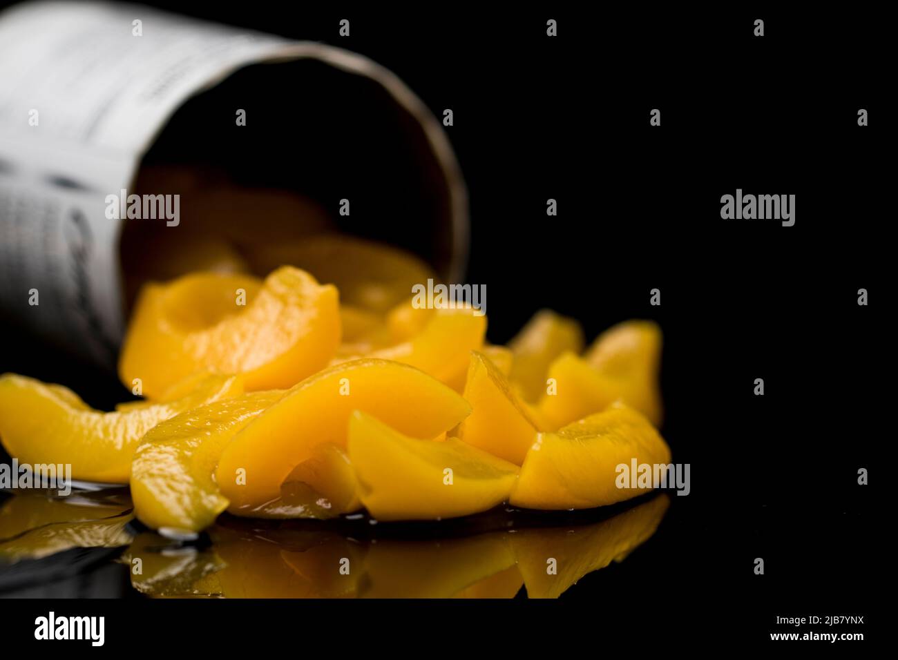 Peaches canned fruit peach slices close up. Stock Photo