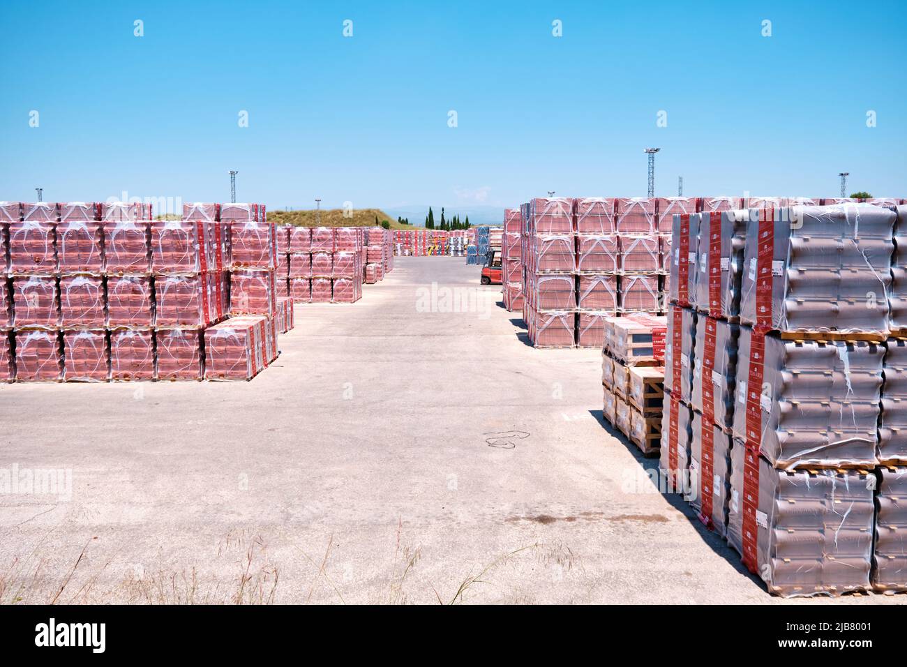 Valencia, spain - June 1, 2022: An outdoor material warehouse full of boxes without being shipped, with delivery delay. Stock Photo