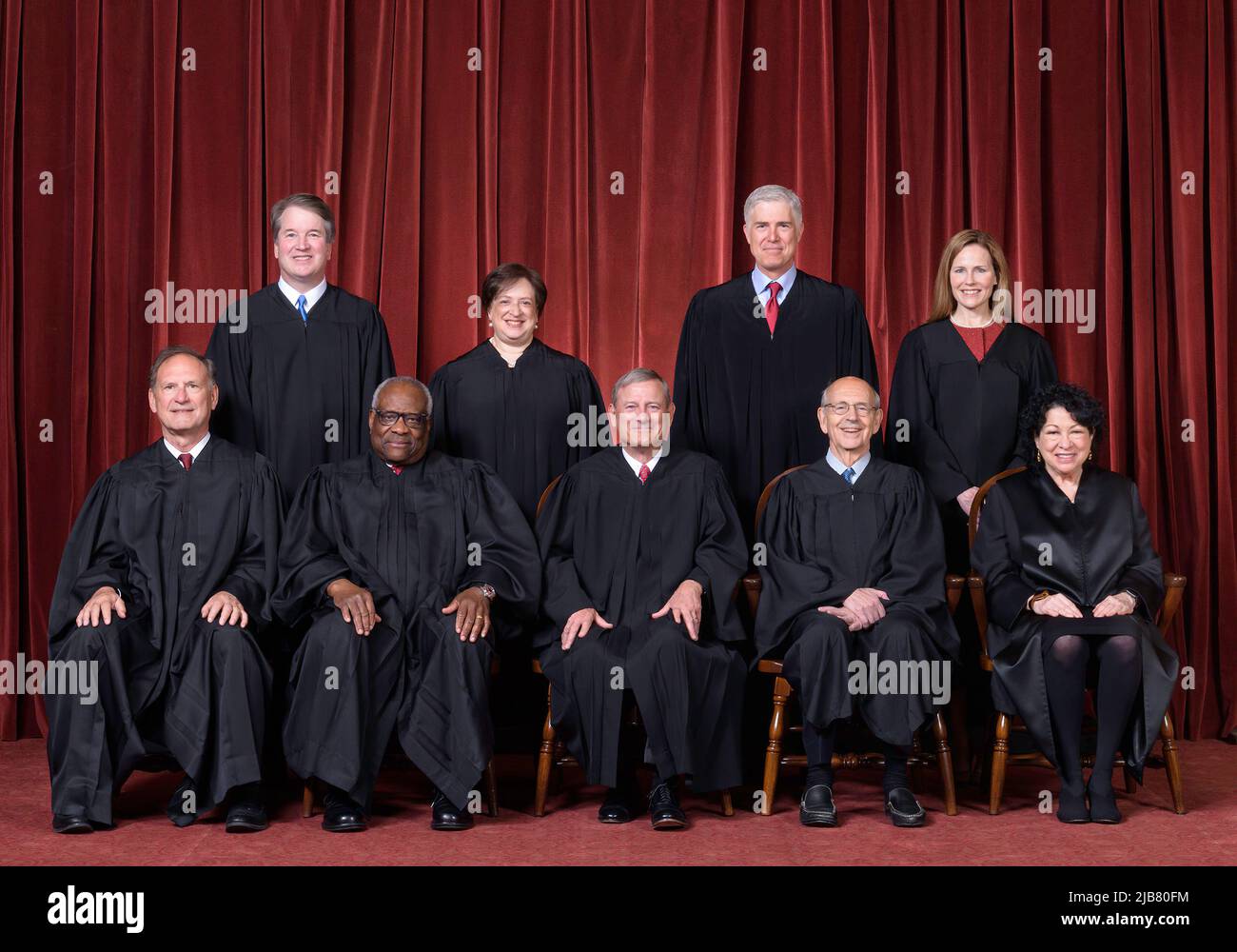 Official group portrait of all U.S. Supreme Court Justices on April 23, 2021.  Front row, left to right — Associate Justice Samuel A. Alito, Associate Justice Clarence Thomas, Chief Justice John G. Roberts, Jr., Associate Justice Stephen G. Breyer, Associate Justice Sonia Sotomayor.  Back row — Associate Justice Brett M. Kavanaugh, Associate Justice Elena Kagan, Associate Justice Neil M. Gorsuch, Associate Justice Amy Coney Barrett.  (Photo by Fred Schilling / Collection of the Supreme Court of the United States) Stock Photo