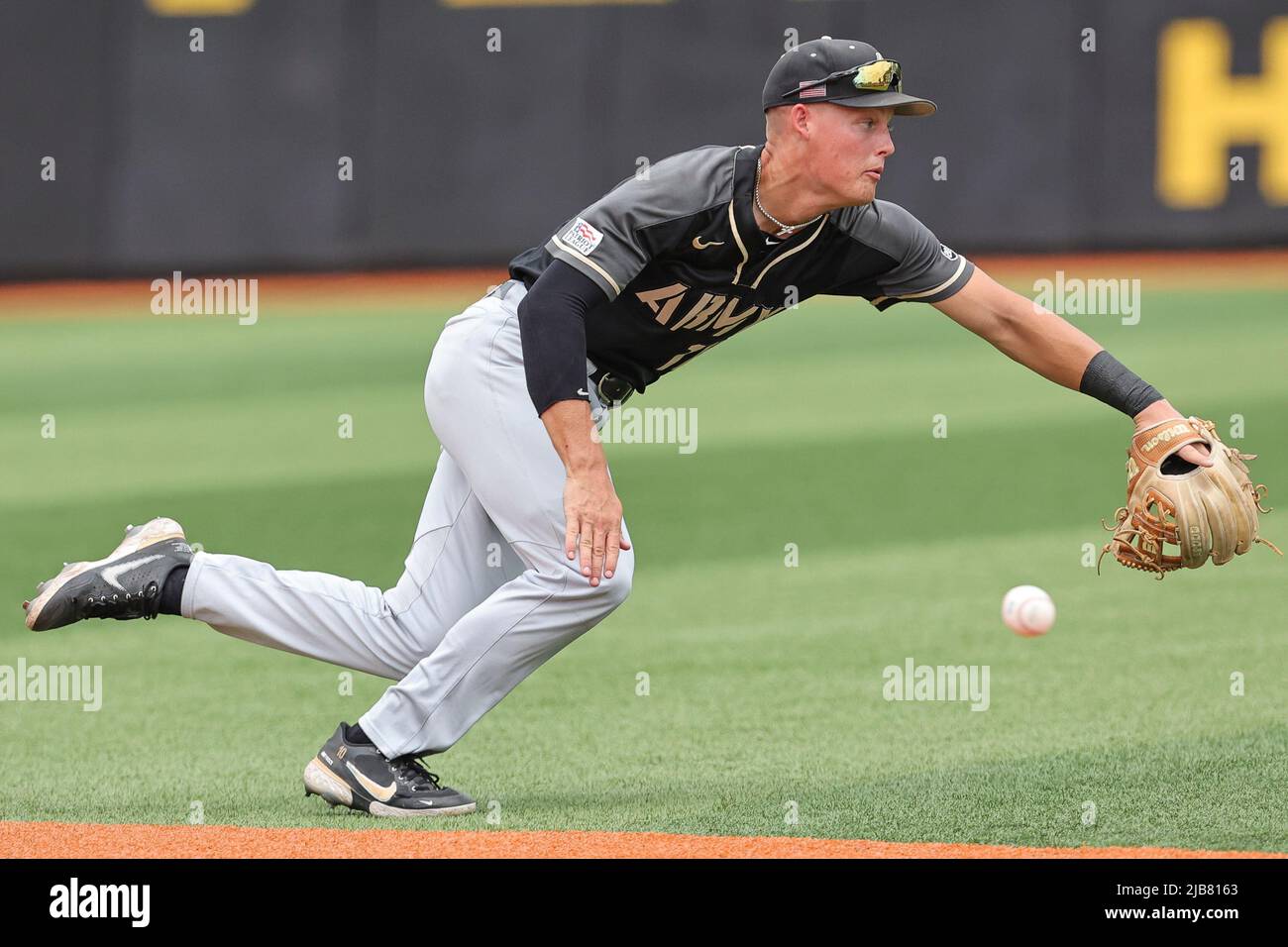 Jun 3, 2022: Army West Point Derek Berg (10) stretches to try and field