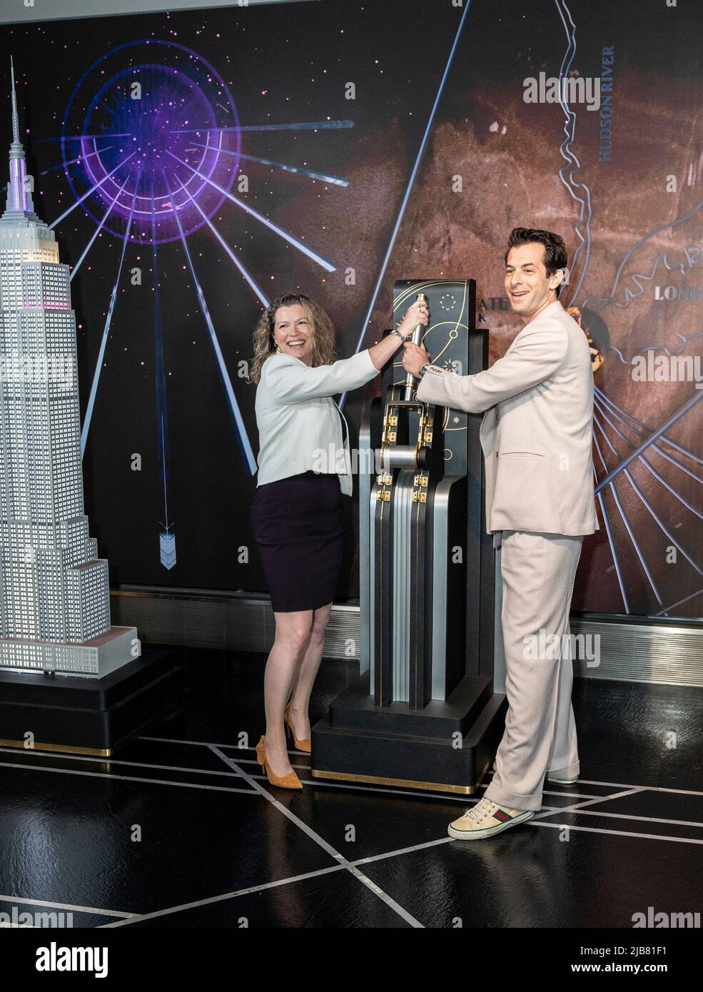 New York, USA. 03rd June, 2022. Emma Wade-Smith, British Consul General and DJ Mark Ronson visit the iconic Empire State Building to light building in purple and gold to honor the Platinum Jubilee of Queen Elizebeth II (Photo by Lev Radin/Pacific Press) Credit: Pacific Press Media Production Corp./Alamy Live News Stock Photo