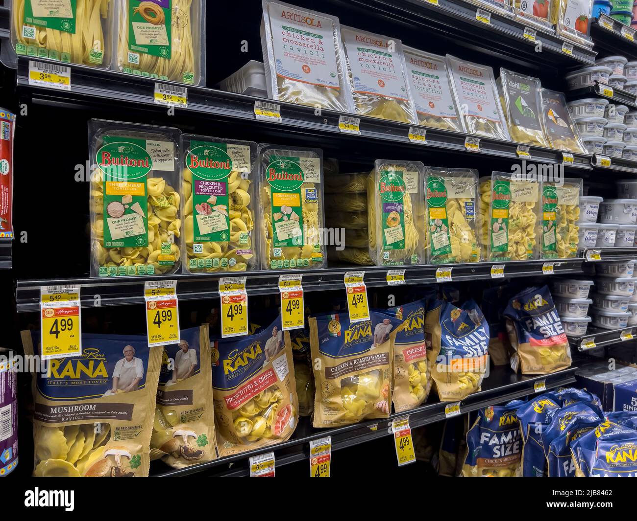 Woodinville, WA USA - circa May 2022: Angled view of a variety of pre-packaged refrigerated pasta for sale inside a Haggen Northwest Fresh grocery sto Stock Photo