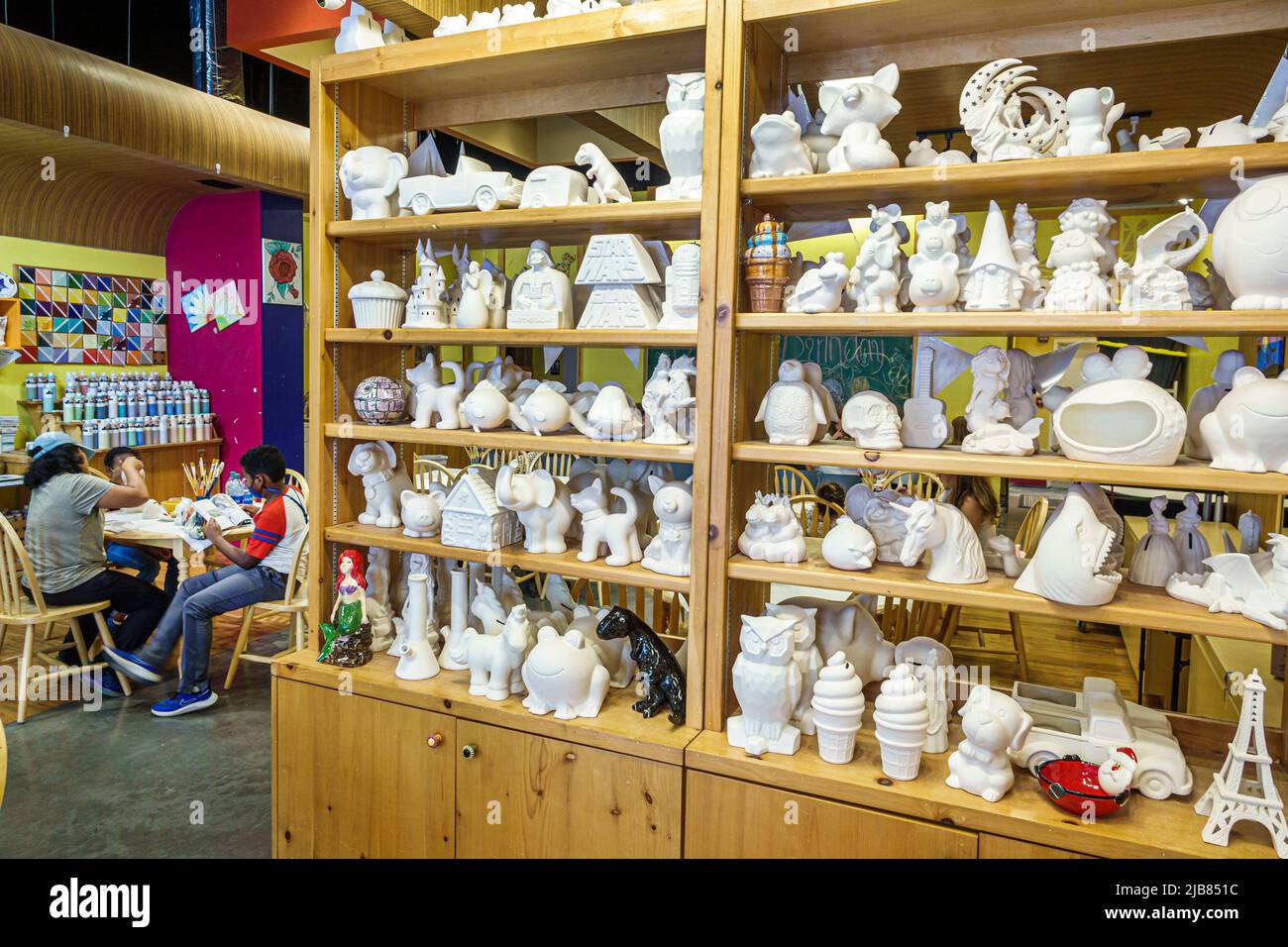 Hallandale Florida Miami,The Village at Gulfstream Park shopping,Color Me Mine Paint-It-Yourself ceramic pottery store,inside interior vases shelves u Stock Photo