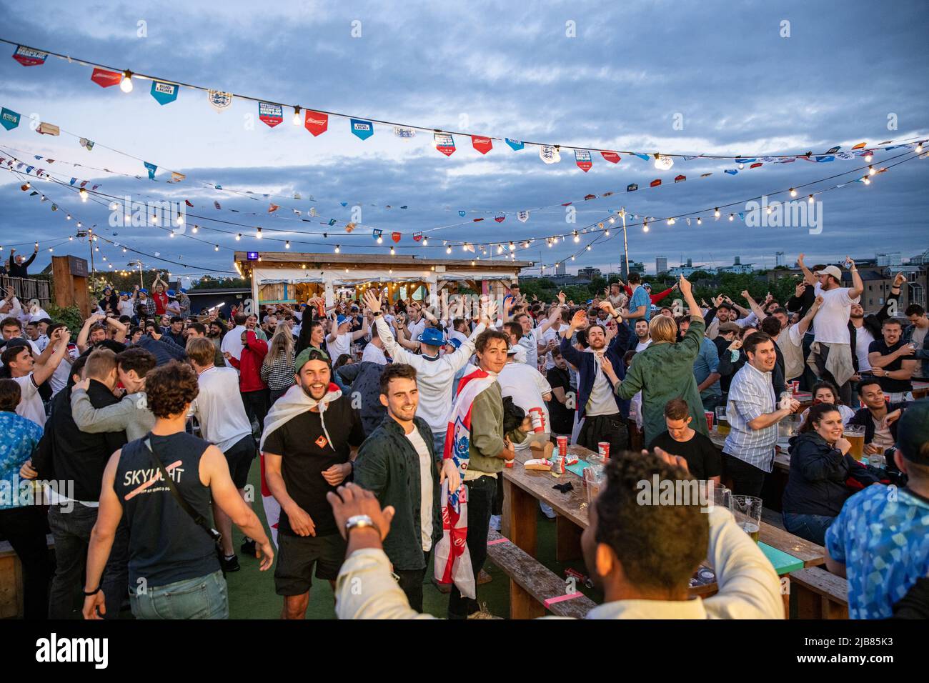 England football fans watch and celebrate the Euros match against the