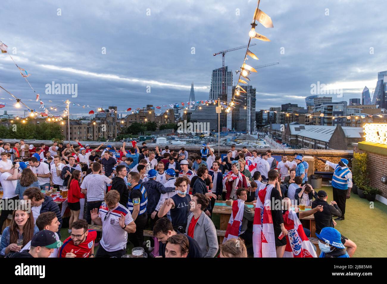 England football fans watch and celebrate the Euros match against the