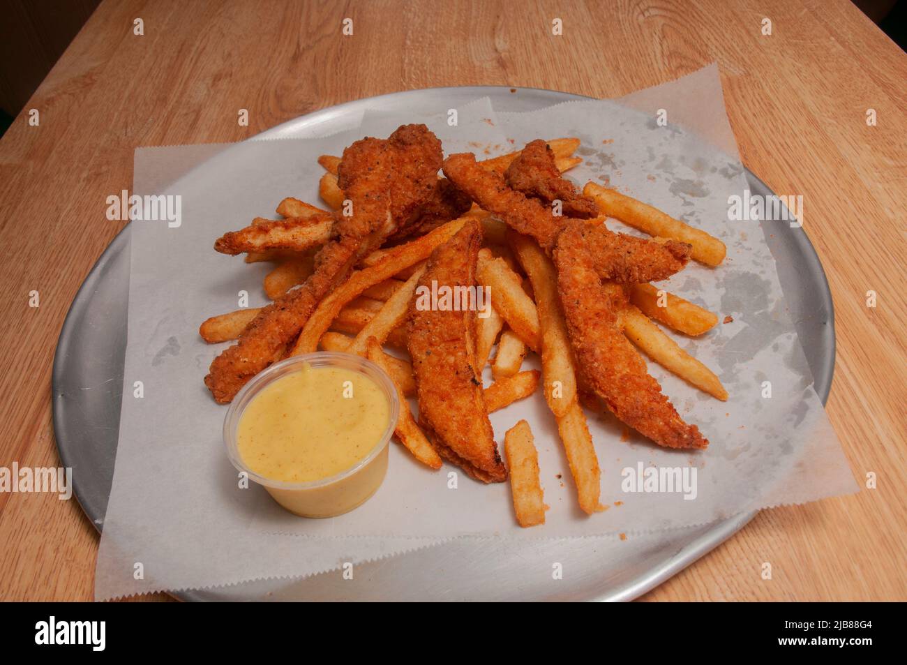 American cuisine dish known as chicken tenders Stock Photo Alamy