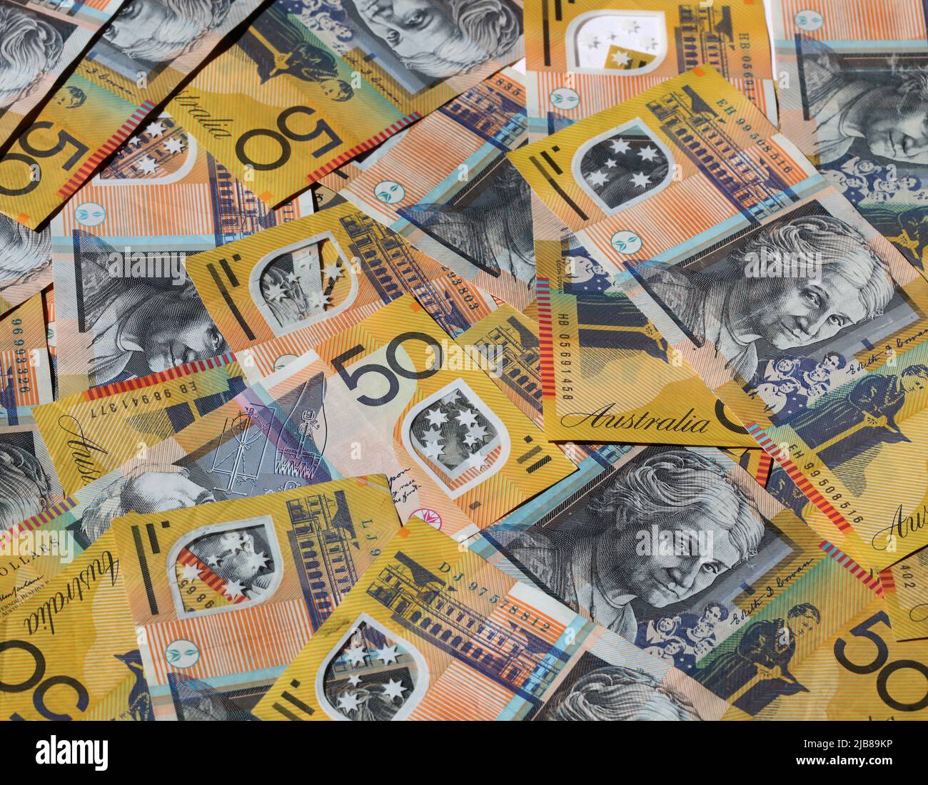Closeup of many Australian 50 dollar notes. Stock Photo