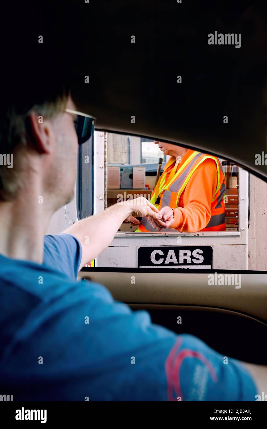 Toll booth car money hi-res stock photography and images - Alamy
