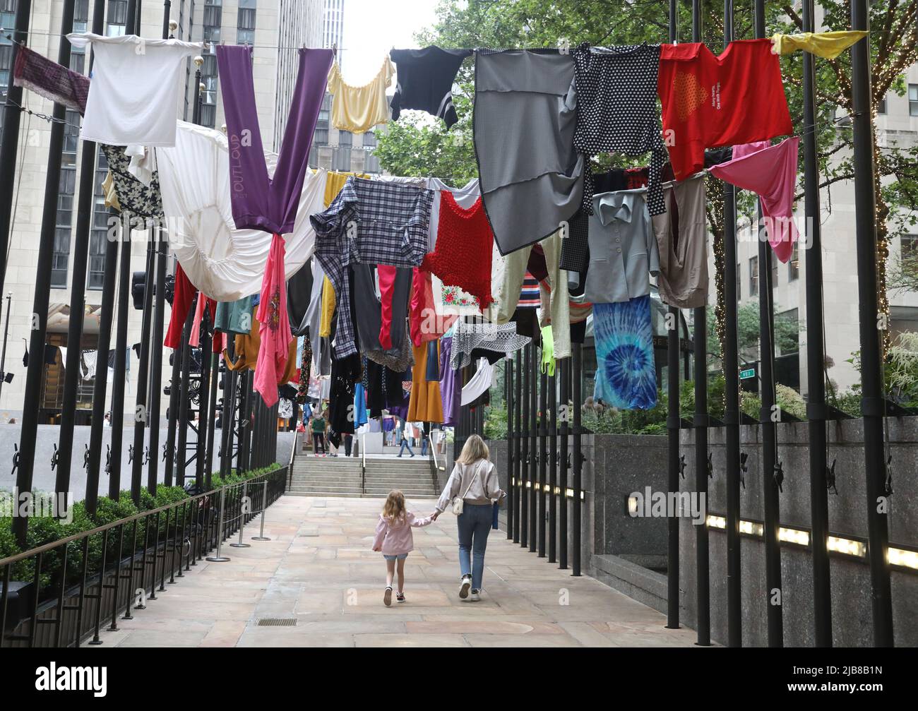 New York, USA. 3rd June, 2022. A view of the Mexican artist Pia Camil's  exhibition ""˜Air Out Your Dirty Laundry' clothing from Mexico City, seen  at Rockefeller Center Plaza. The community clothesline