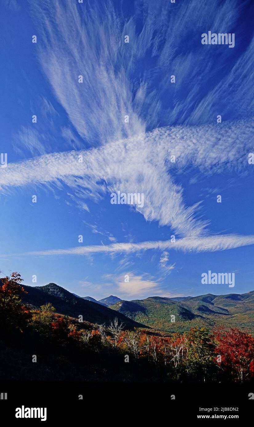 Clouds form contrasting patterns over New Hampshire's White Mountains Stock Photo