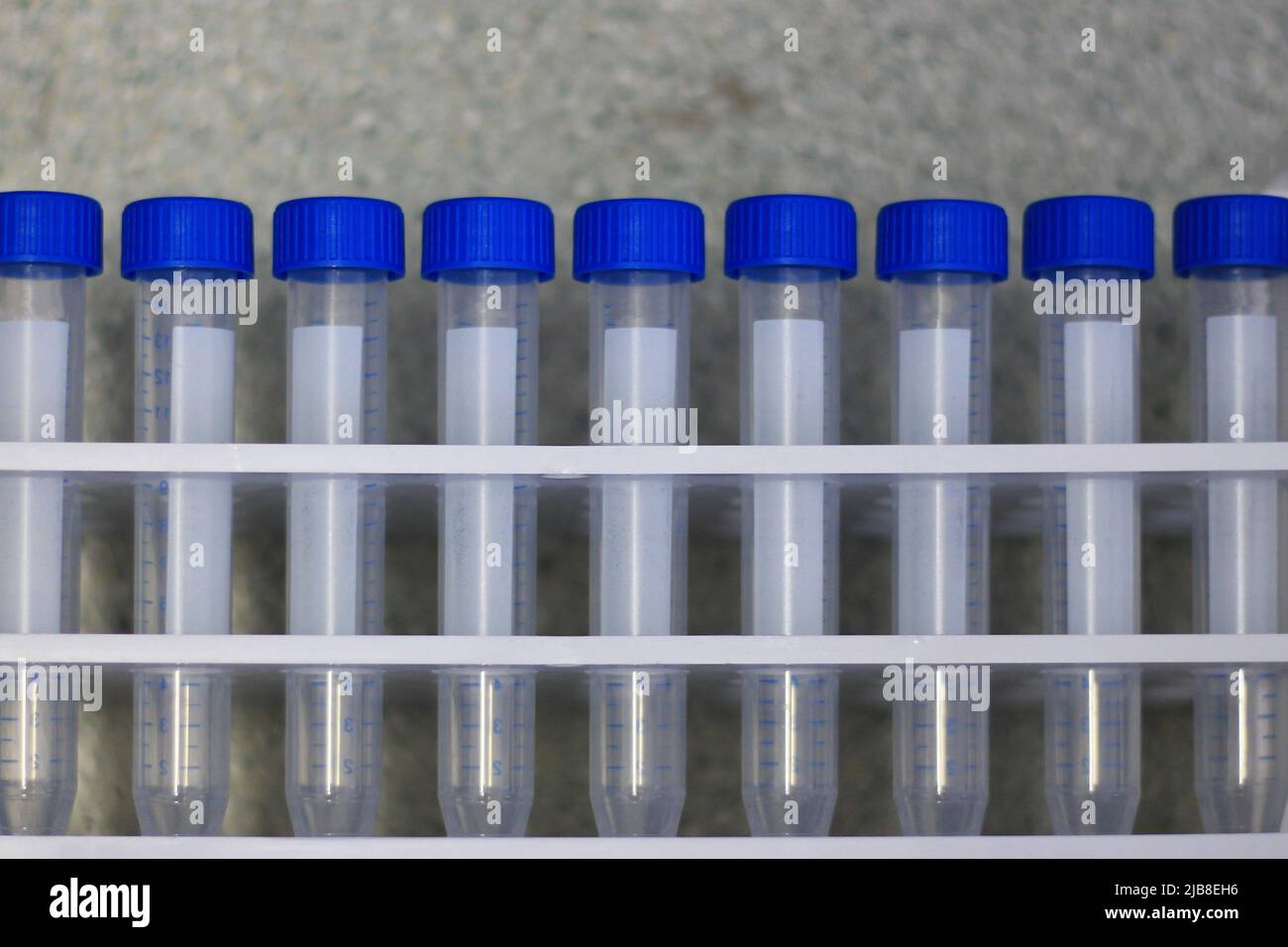 blue Laboratory tube shows Stock Photo Alamy