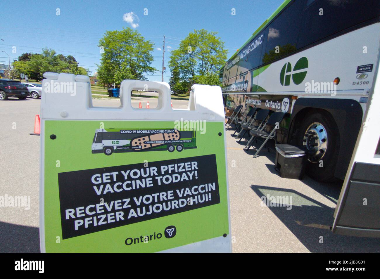 Sign infront of the Ontario Mobile COVID-19 Vaccine Clinic Bus made a stop in Toronto, Ontario to give out free shots to Stock Photo