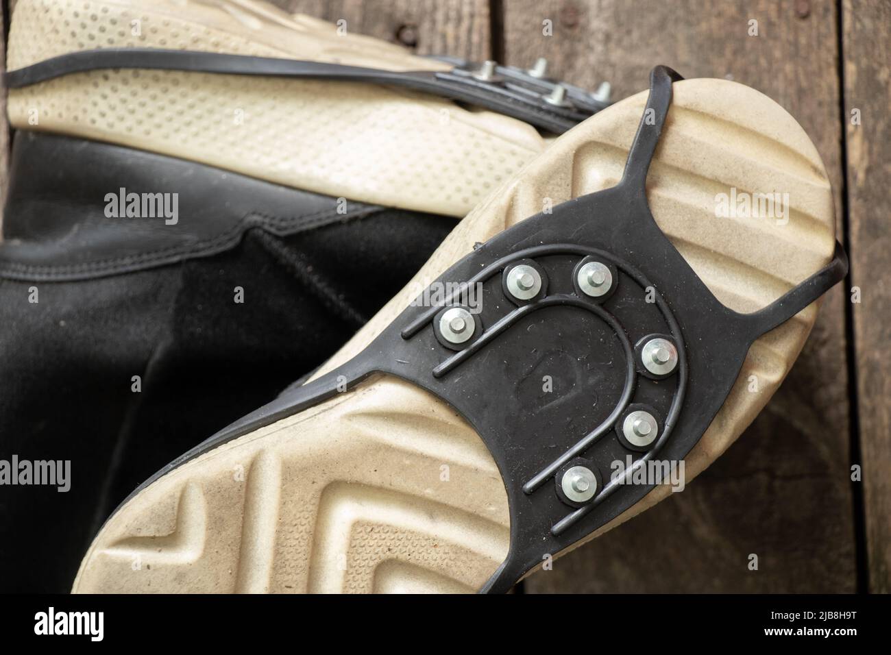 ice access on shoes, protection against slipping on ice on shoes Stock