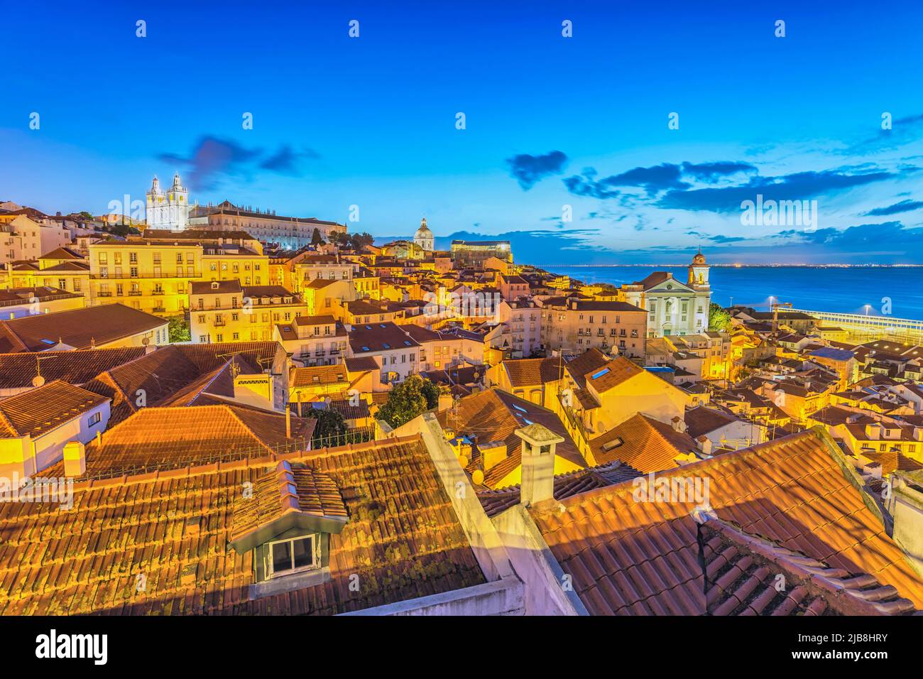 Lisbon Portugal night city skyline at Lisbon Alfama district Stock Photo