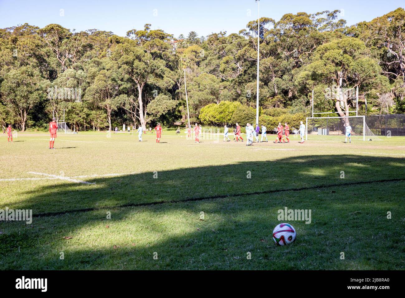 Amateur soccer football match played at Balmoral Oval in Mosman,Sydney, over 45's age group players,Australia Stock Photo