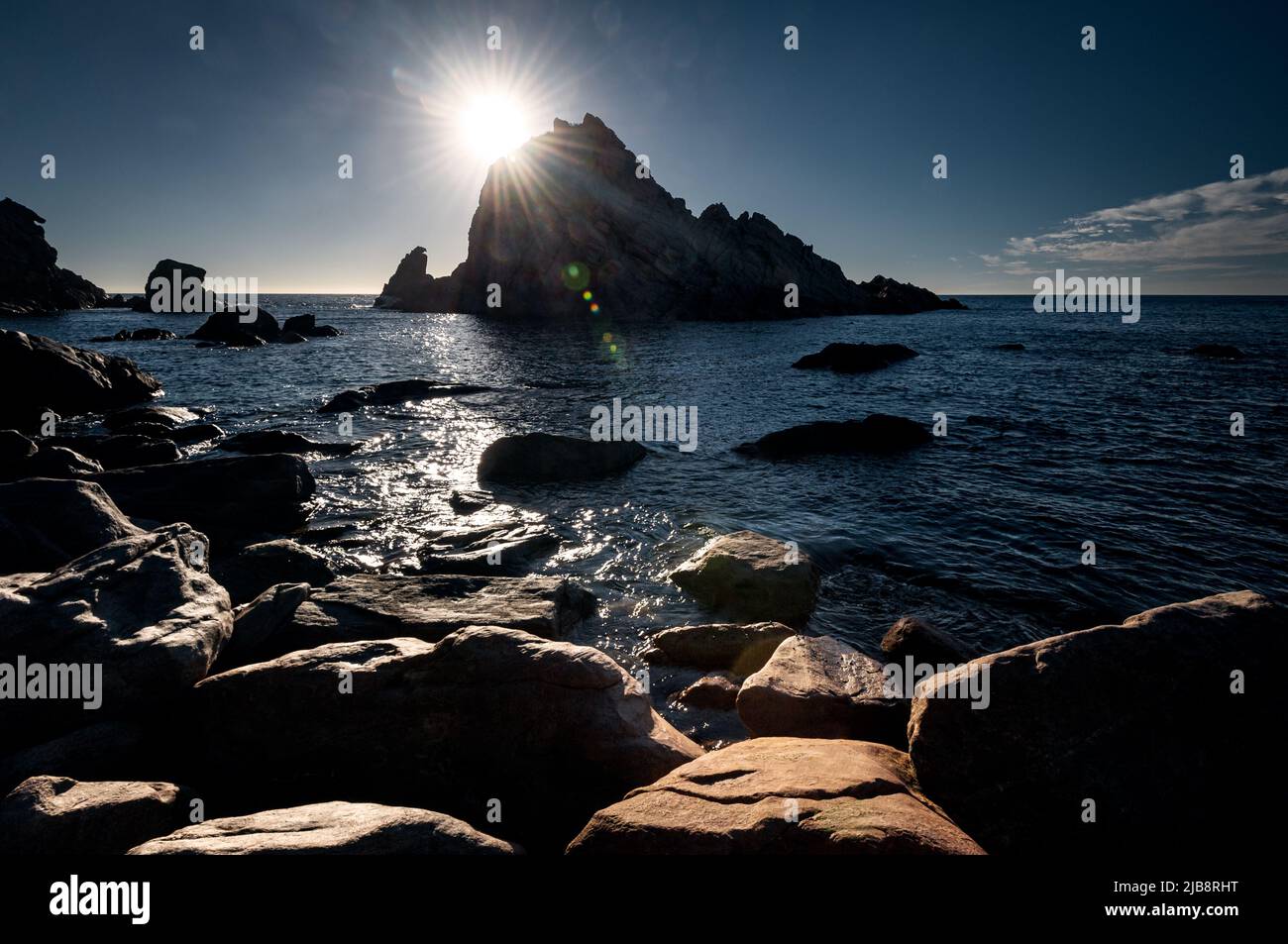 Sugarloaf Rock in Leeuwin-Naturaliste National Park touched by the setting sun. Stock Photo