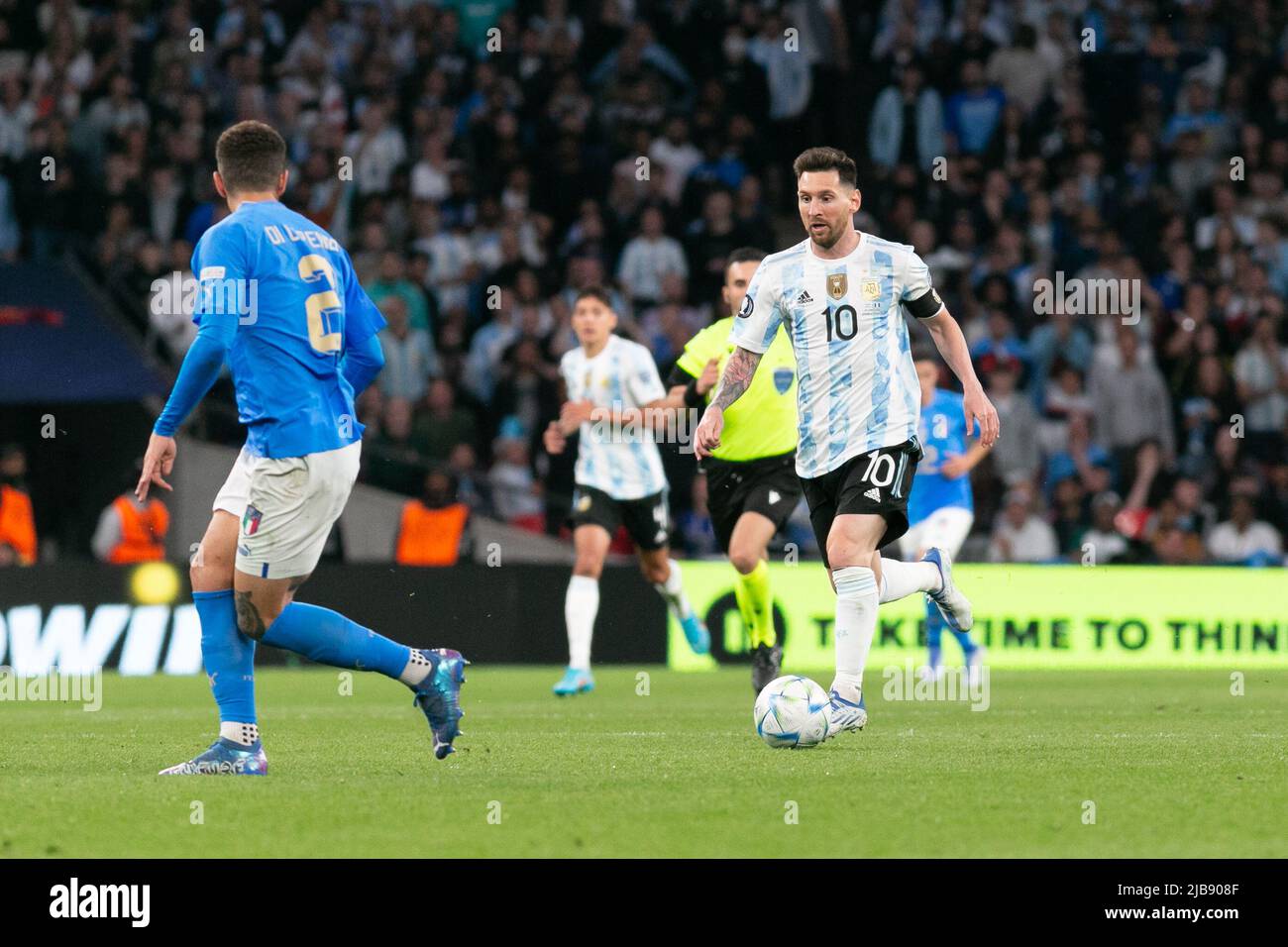 Lionel Messi (c) of Argentina  runs with the ball during the Italy v Argentina - Finalissima 2022 match at Wembley Stadium on June 1, 2022 in London, England.(MB Media) Stock Photo