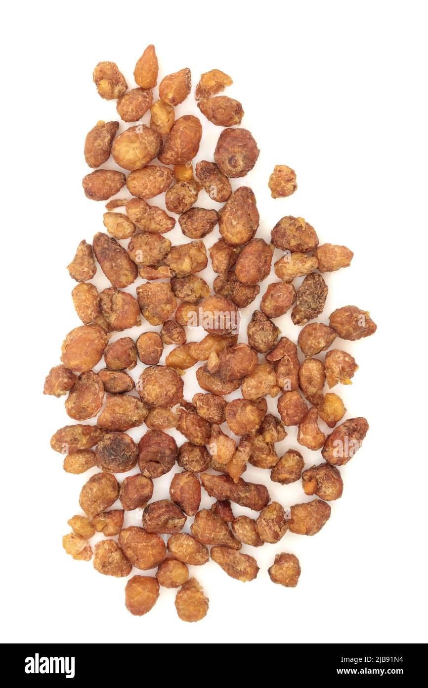 Pinellia tuber herb used in traditional Chinese herbal medicine on white background. Used to treat nausea, influenza, flu, swine flu, morning sickness Stock Photo