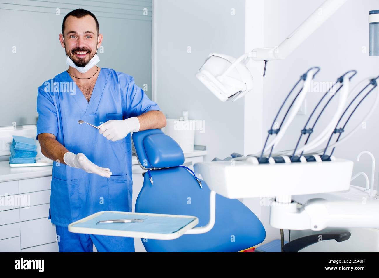 Dentist is ready to accept client in clinic Stock Photo Alamy