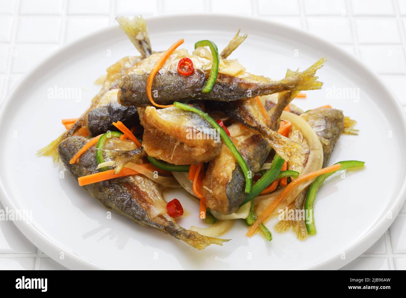 small fish escabeche ( deep fried horse mackerel marinated in spicy
