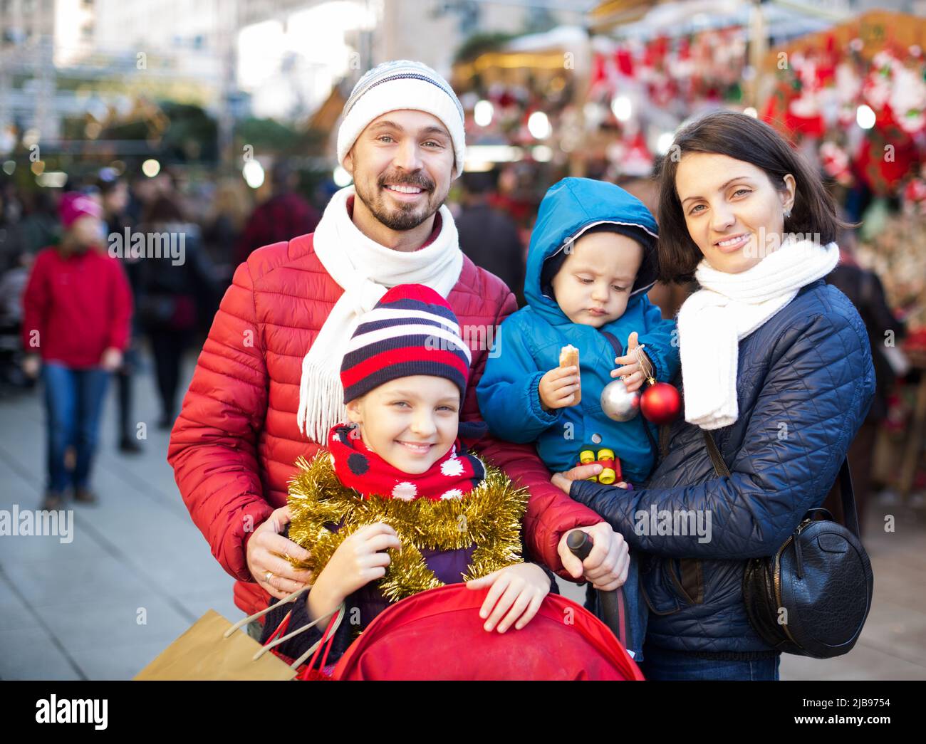 Winter portrait of happy family Stock Photo - Alamy