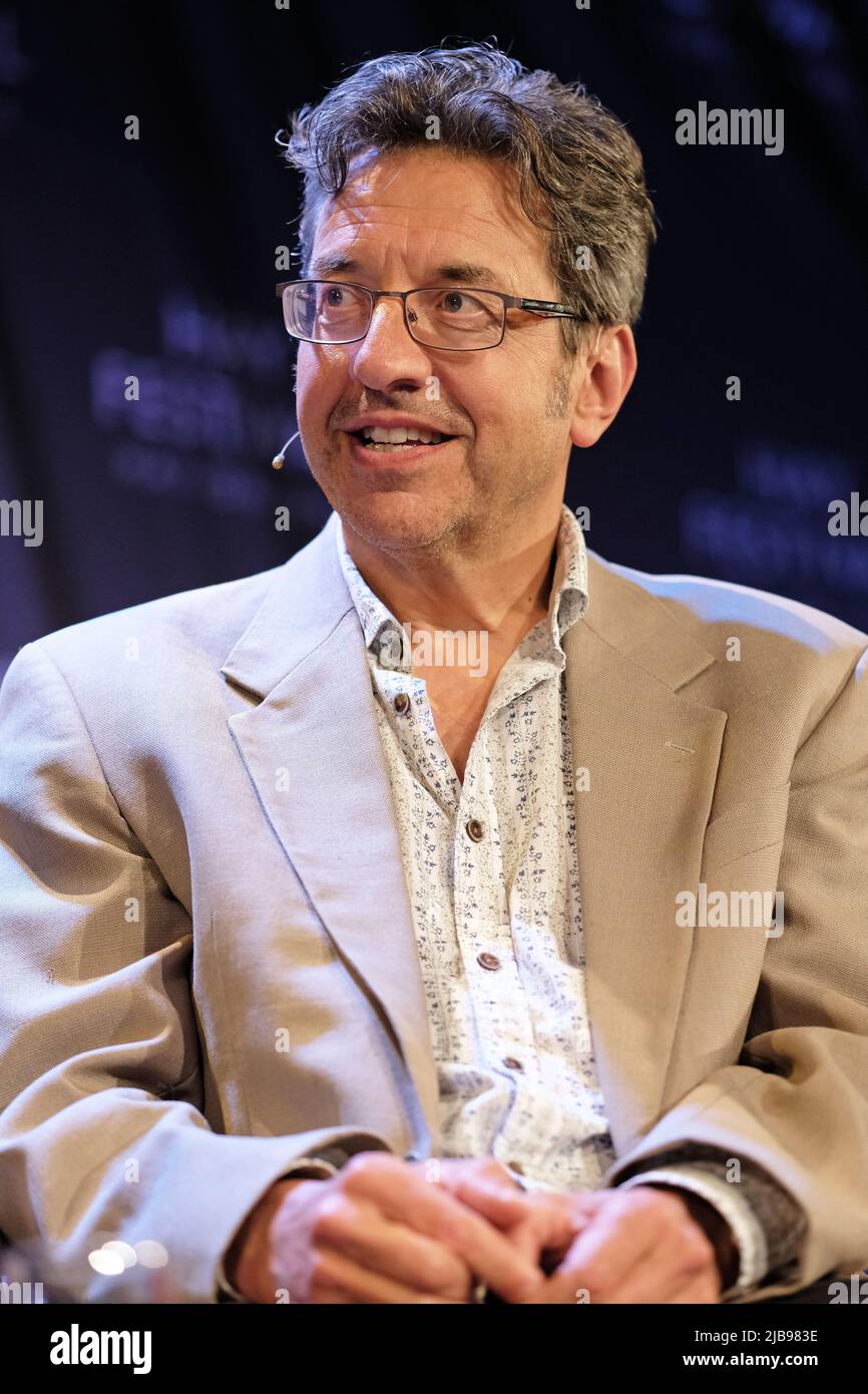 Hay Festival, Hay on Wye, Wales, UK – Saturday 4th June 2022 – George Monbiot journalist and author on stage at the Hay Festival to debate environmental issues in a talk called Rivers as Sewers. Photo Steven May / Alamy Live News Stock Photo