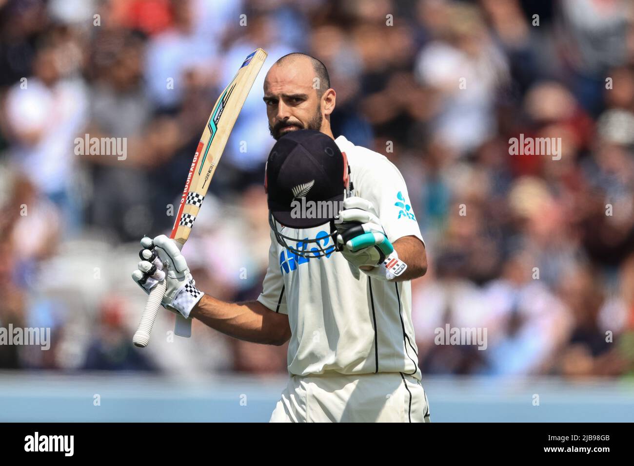 Daryl Mitchell of New Zealand is dismissed by Stuart Broad of England